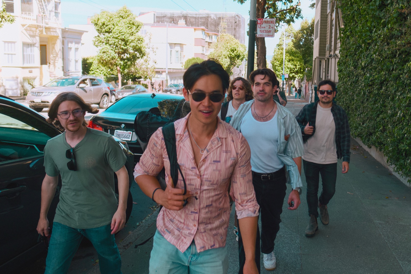 Band walking down a sunny San Francisco street